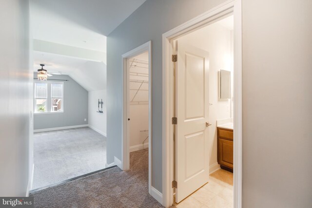 8266 Saint Francis Dr, Severn, MD 21144 - hallway featuring light carpet and lofted ceiling