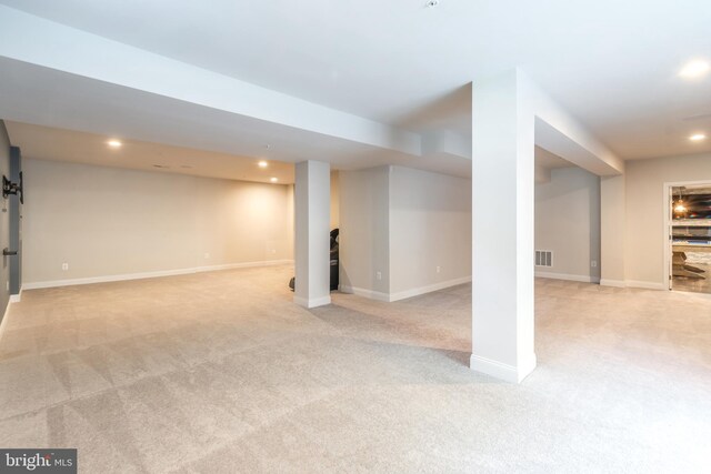 8266 Saint Francis Dr, Severn, MD 21144 - finished basement with light carpet and recessed lighting