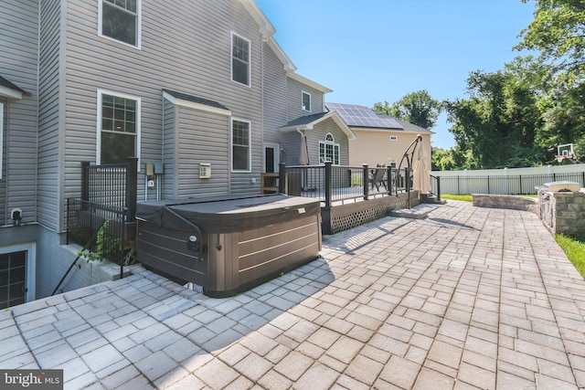 8266 Saint Francis Dr, Severn, MD 21144 - fenced backyard with a hot tub, a patio area, and a deck