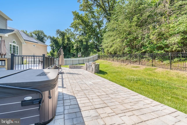8266 Saint Francis Dr, Severn, MD 21144 - fenced backyard with a patio area, grilling area, and a hot tub