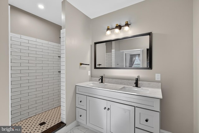117 Pearl St, Lancaster, PA 17603 - full bathroom with a tile shower, double vanity, marble look tiles, and recessed lighting