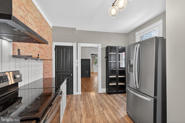 117 Pearl St, Lancaster, PA 17603 - kitchen with appliances with stainless steel finishes, wall chimney exhaust hood, light wood finished floors, dark stone countertops, and open shelves