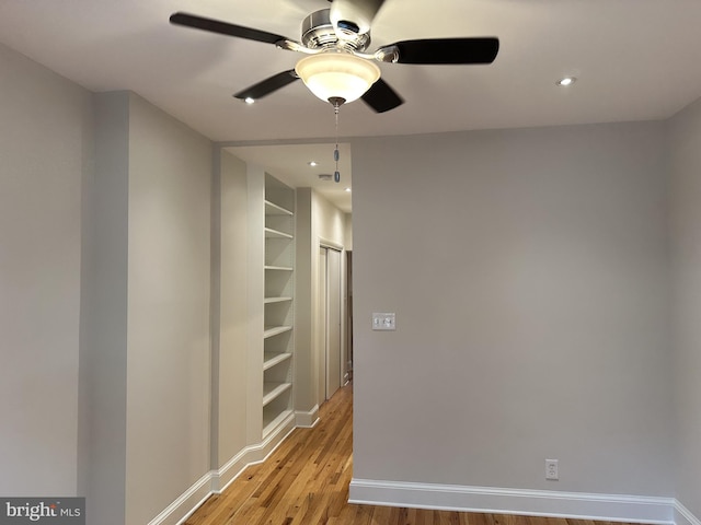 1423 T St NW, Washington, DC 20009 - empty room with a ceiling fan, light wood-style flooring, recessed lighting, and built in features