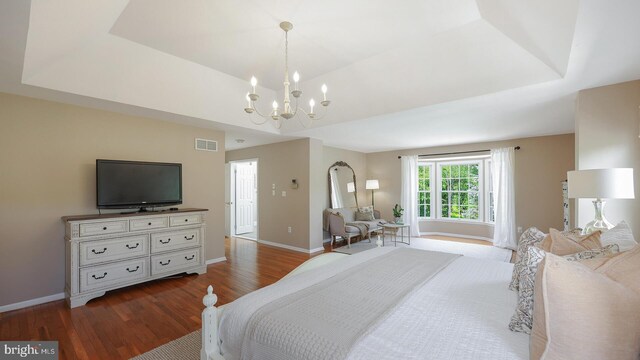 24 Montfort Dr, Belle Mead, NJ 08502 - bedroom featuring wood finished floors, a chandelier, and a tray ceiling