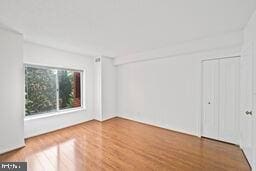 5802 Nicholson Ln Unit 2-L05, Rockville, MD 20852 - unfurnished bedroom featuring wood finished floors