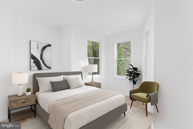 1804 E Lafayette Ave, Baltimore, MD 21213 - bedroom featuring wood finished floors and baseboards