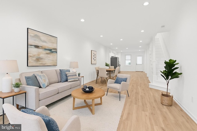 1804 E Lafayette Ave, Baltimore, MD 21213 - living room with light wood finished floors and recessed lighting