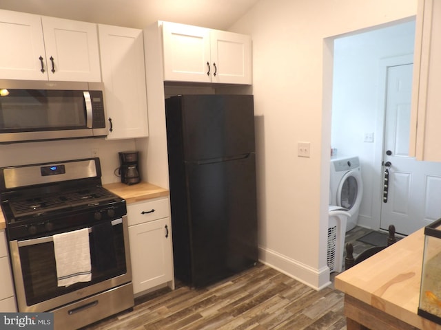 161 Main St, Southampton, NJ 08088 - kitchen with stainless steel appliances, dark wood finished floors, washer / clothes dryer, and white cabinetry