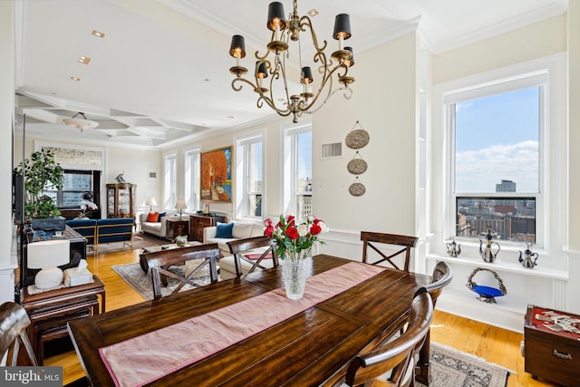 1425 Locust St Unit 33A, Philadelphia, PA 19102 - dining space with a chandelier, crown molding, wood finished floors, coffered ceiling, and beamed ceiling