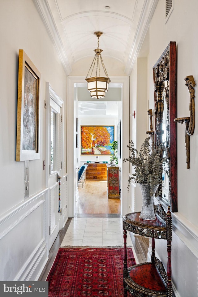 1425 Locust St Unit 33A, Philadelphia, PA 19102 - entrance foyer with vaulted ceiling, a chandelier, and ornamental molding