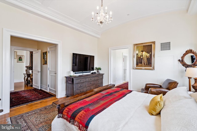 1425 Locust St Unit 33A, Philadelphia, PA 19102 - bedroom featuring a chandelier, wood finished floors, and lofted ceiling