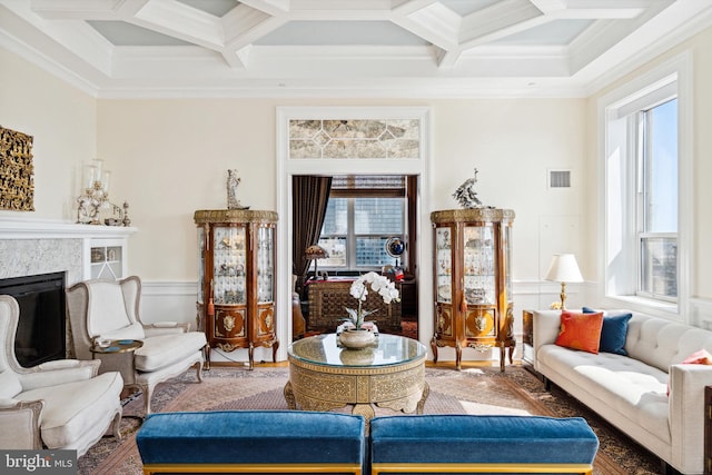 1425 Locust St Unit 33A, Philadelphia, PA 19102 - living room featuring coffered ceiling, crown molding, a fireplace, beam ceiling, and wood finished floors