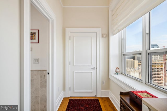 1425 Locust St Unit 33A, Philadelphia, PA 19102 - doorway with wood finished floors and crown molding