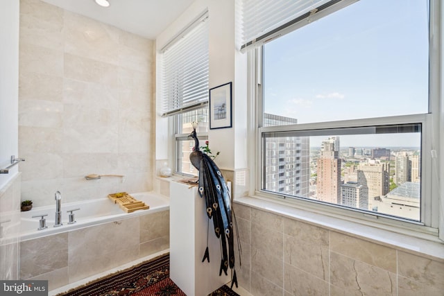 1425 Locust St Unit 33A, Philadelphia, PA 19102 - full bath featuring a bath, tile walls, and a city view