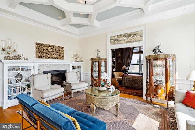1425 Locust St Unit 33A, Philadelphia, PA 19102 - living area featuring coffered ceiling, wood finished floors, ornamental molding, beamed ceiling, and a premium fireplace