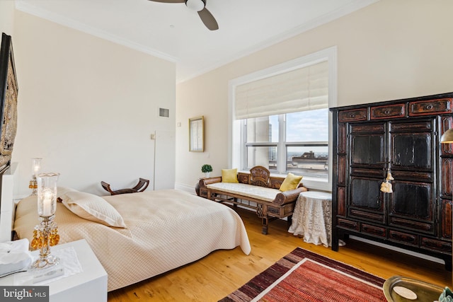 1425 Locust St Unit 33A, Philadelphia, PA 19102 - bedroom with crown molding, wood finished floors, and ceiling fan