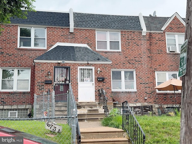 6736 Leonard St, Philadelphia, PA 19149 - view of property with brick siding, roof with shingles, and cooling unit