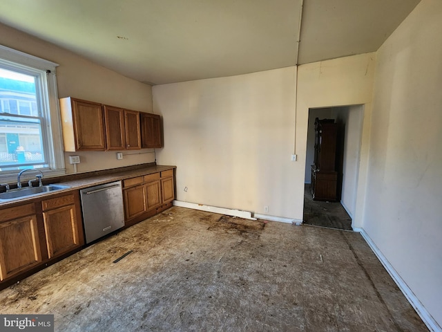 1226 Bloomingdale Rd, Baltimore, MD 21216 - kitchen with dishwasher, dark countertops, and brown cabinets