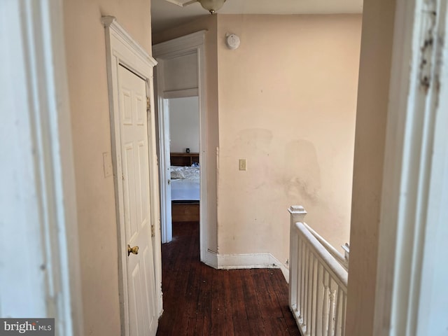 1226 Bloomingdale Rd, Baltimore, MD 21216 - hallway with dark wood-type flooring and an upstairs landing