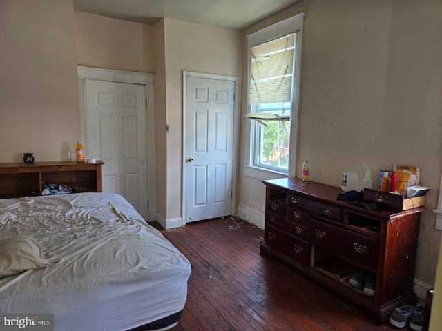 1226 Bloomingdale Rd, Baltimore, MD 21216 - bedroom with dark wood finished floors and baseboards
