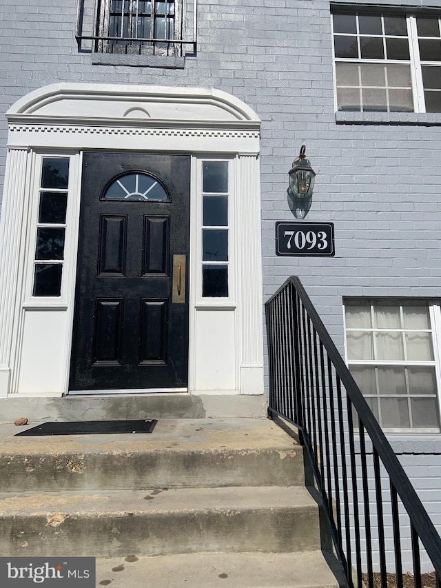 7093 Spring Garden Dr Unit 202, Springfield, VA 22150 - doorway to property featuring brick siding