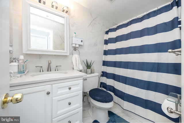 7093 Spring Garden Dr Unit 202, Springfield, VA 22150 - full bathroom featuring vanity, tile walls, and curtained shower