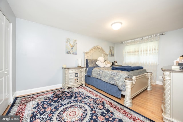 7093 Spring Garden Dr Unit 202, Springfield, VA 22150 - bedroom with wood finished floors and baseboards