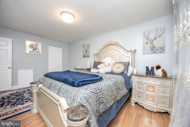 7093 Spring Garden Dr Unit 202, Springfield, VA 22150 - bedroom with wood finished floors and a closet