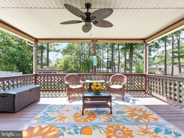 117 Amherst Ct, Stephens City, VA 22655 - wooden terrace with a ceiling fan, a storage unit, and view of scattered trees