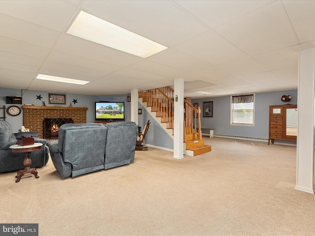117 Amherst Ct, Stephens City, VA 22655 - living room featuring a baseboard heating unit, carpet floors, stairway, a paneled ceiling, and a brick fireplace