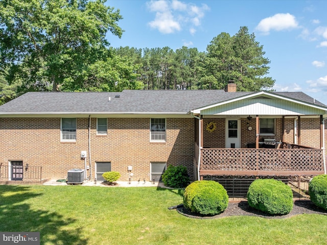 117 Amherst Ct, Stephens City, VA 22655 - back of property featuring a chimney, a lawn, roof with shingles, and brick siding