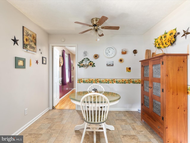 117 Amherst Ct, Stephens City, VA 22655 - dining room featuring stone tile floors and ceiling fan