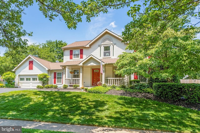 20304 Watkins Meadow Dr, Germantown, MD 20876 - traditional-style home with a porch, driveway, a front yard, roof with shingles, and an attached garage
