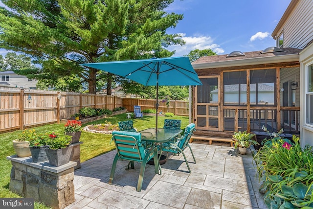 20304 Watkins Meadow Dr, Germantown, MD 20876 - fenced backyard featuring a patio area, outdoor dining area, and a sunroom