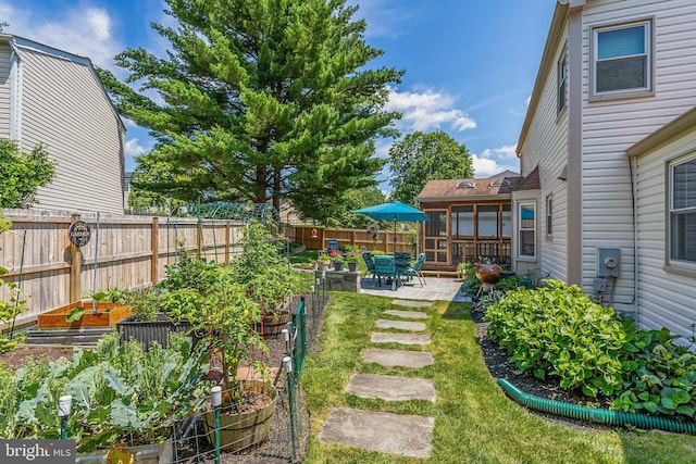 20304 Watkins Meadow Dr, Germantown, MD 20876 - fenced backyard with a garden and a patio area