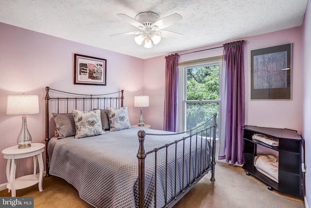 20304 Watkins Meadow Dr, Germantown, MD 20876 - bedroom featuring carpet, a textured ceiling, and a ceiling fan