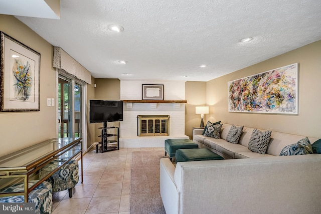 20304 Watkins Meadow Dr, Germantown, MD 20876 - living area featuring a textured ceiling, light tile patterned floors, recessed lighting, and a brick fireplace