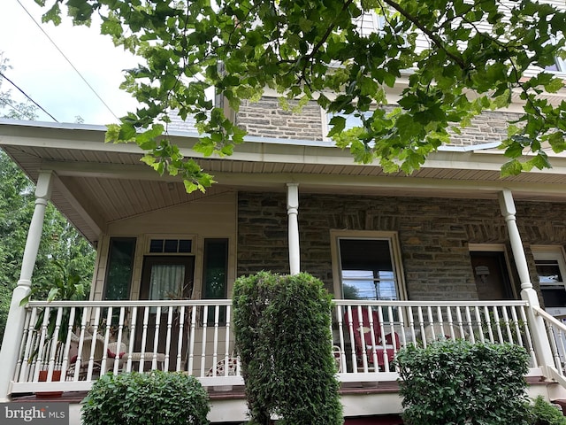 116 Township Line Rd, Jenkintown, PA 19046 - view of side of property with stone siding and covered porch