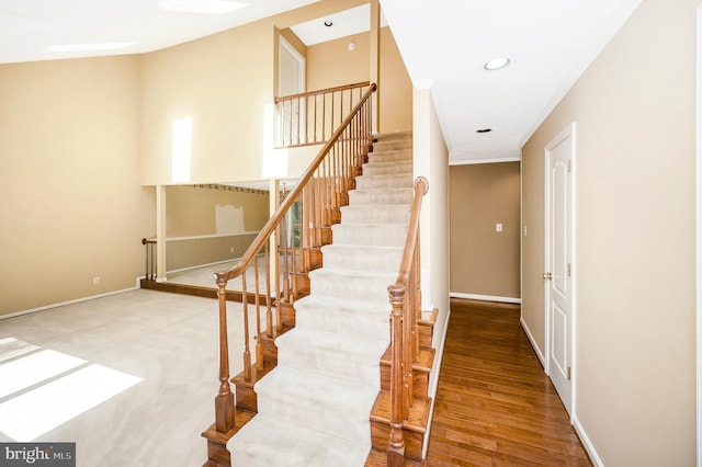 5599 Small Oak Ct, Woodbridge, VA 22192 - stairway with recessed lighting and wood finished floors
