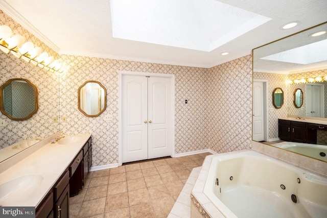 5599 Small Oak Ct, Woodbridge, VA 22192 - bathroom featuring a skylight, ornamental molding, double vanity, a jetted tub, and recessed lighting