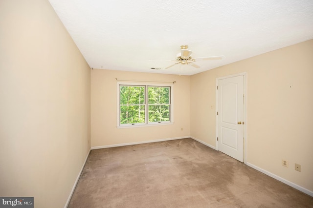 5599 Small Oak Ct, Woodbridge, VA 22192 - unfurnished room featuring a ceiling fan and light carpet