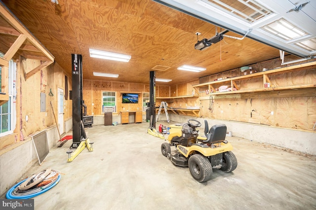 5599 Small Oak Ct, Woodbridge, VA 22192 - garage featuring electric panel and a garage door opener