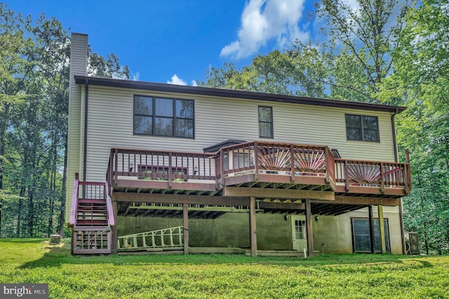 5599 Small Oak Ct, Woodbridge, VA 22192 - rear view of house featuring a deck, a yard, and a chimney
