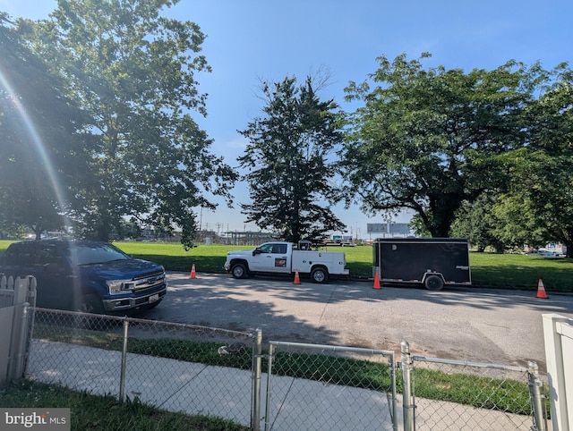 1625 Spruce, Baltimore City, MD 21226 - view of parking / parking lot featuring a gate