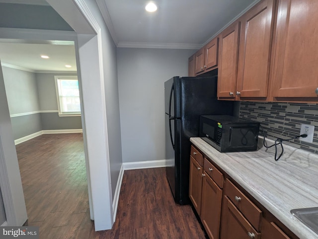 1625 Spruce, Baltimore City, MD 21226 - kitchen with black microwave, dark wood finished floors, crown molding, backsplash, and recessed lighting