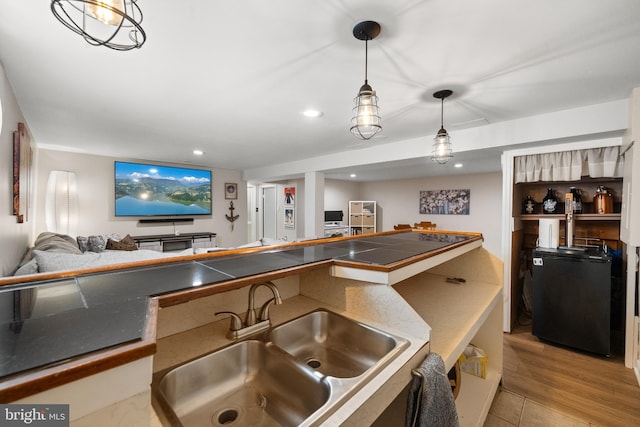 6402 Virginia Hills Ave, Alexandria, VA 22310 - kitchen with open floor plan, fridge, hanging light fixtures, tile counters, and recessed lighting