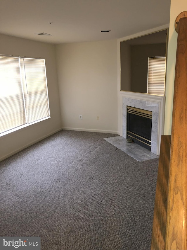938 Newington Ct, Capitol Heights, MD 20743 - unfurnished living room with carpet and a high end fireplace