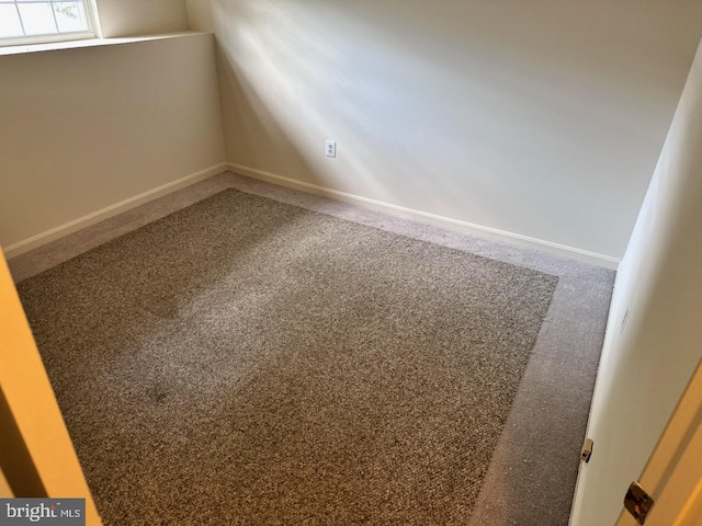 938 Newington Ct, Capitol Heights, MD 20743 - carpeted empty room featuring baseboards