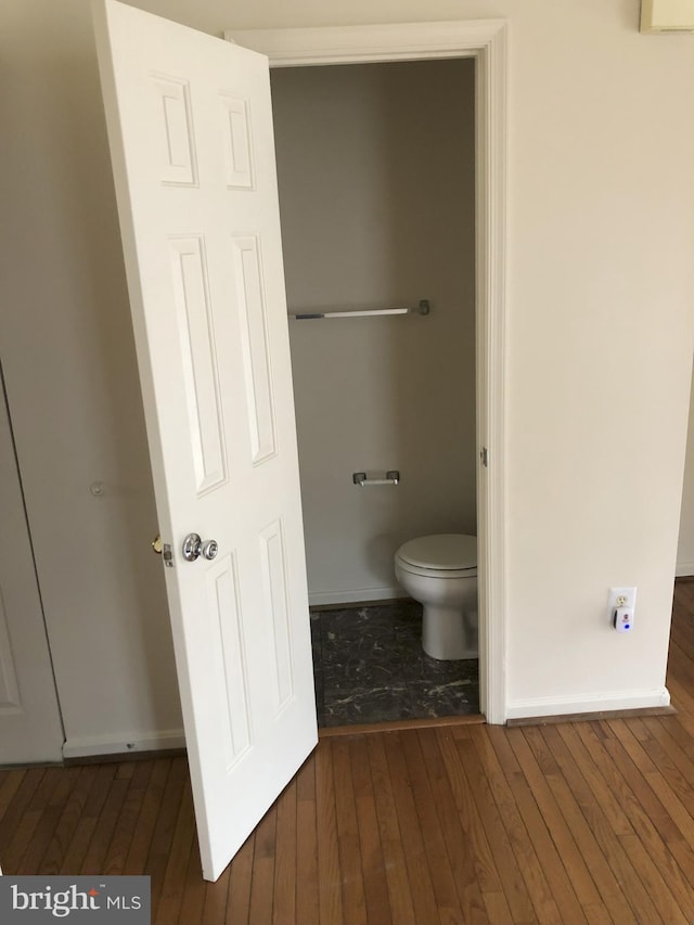 938 Newington Ct, Capitol Heights, MD 20743 - bathroom with hardwood / wood-style flooring and toilet