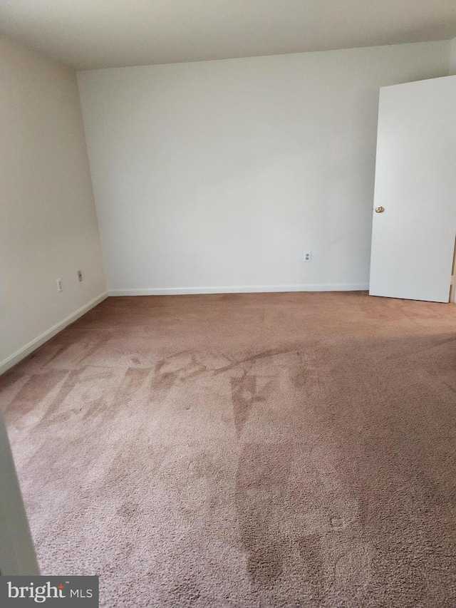 938 Newington Ct, Capitol Heights, MD 20743 - empty room featuring carpet and baseboards